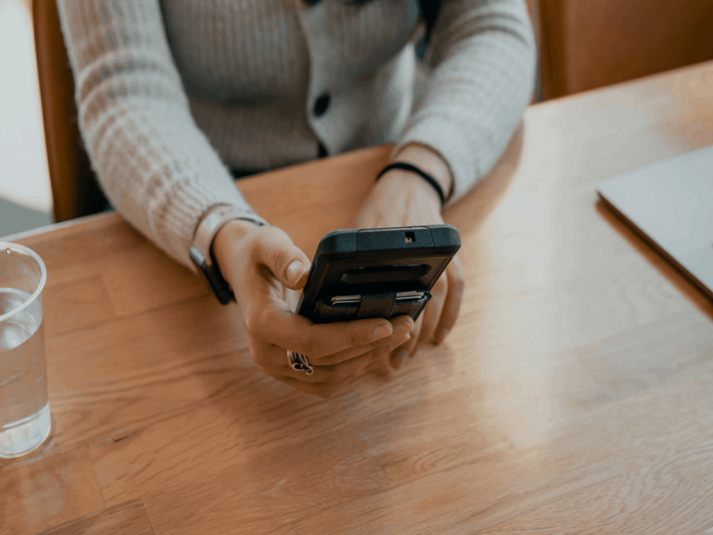 Woman on her phone working property management